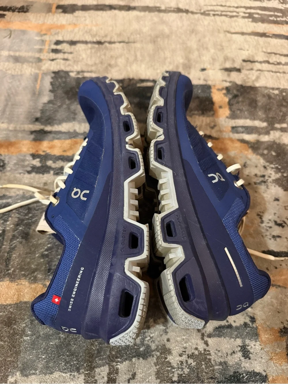 On Running Women’s Cloudrunner Athletic Shoes in Navy and Cream